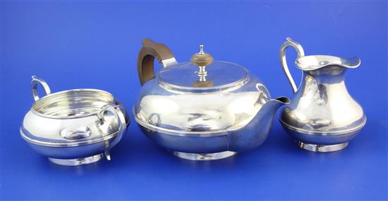 A 1930s three piece silver tea set, gross 39.5 oz.